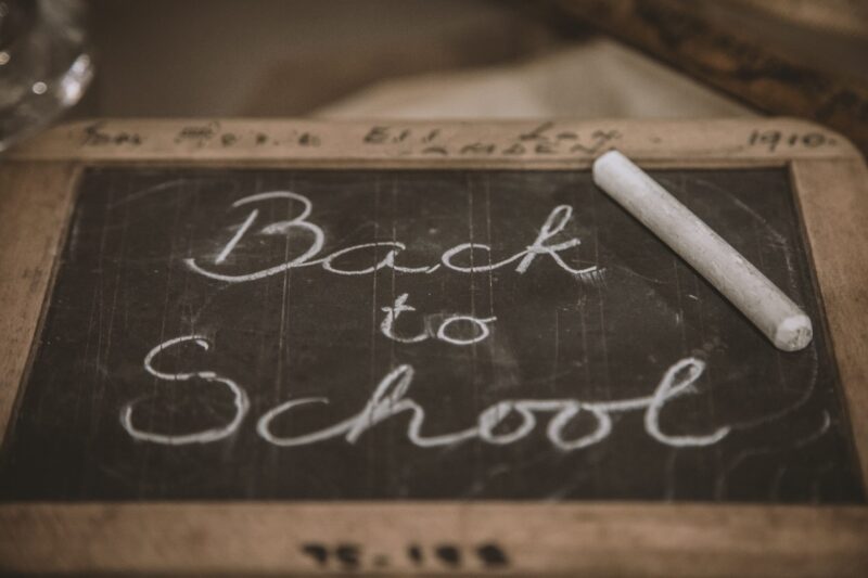 Image of a chalkboard with "Back to School" written in cursive.